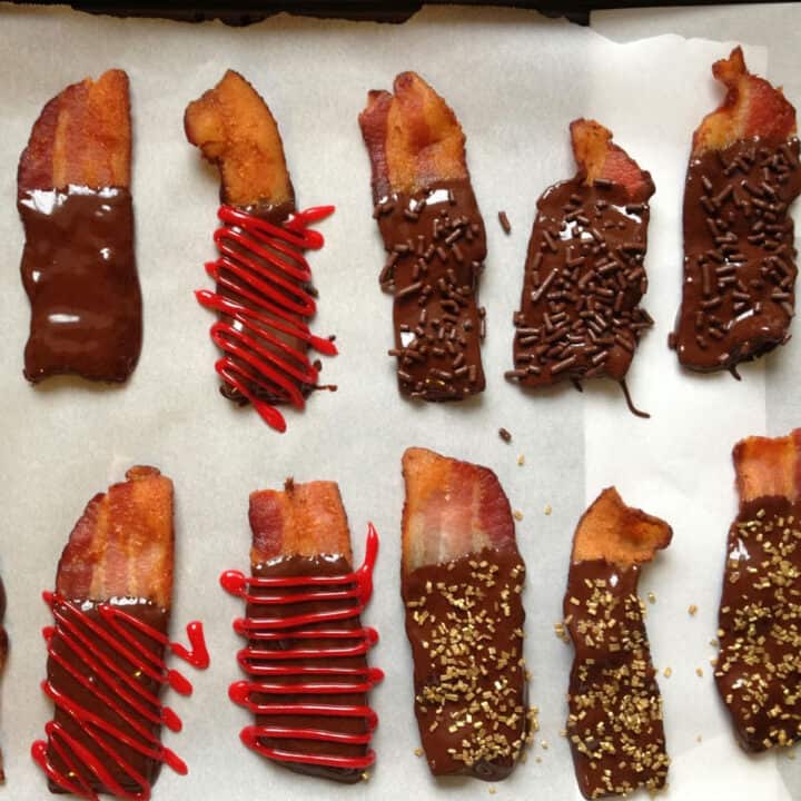 Strips of bacon dipped in chocolate and decorated with icing and sprinkles