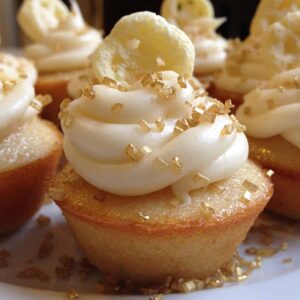Honey vanilla cupcakes topped high with frosting and honeycomb cereal