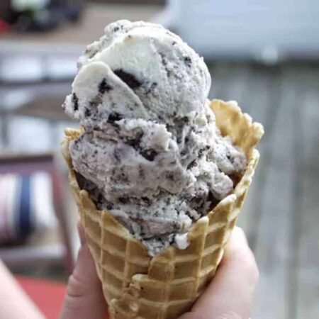 Oreo ice cream in a large waffle cone