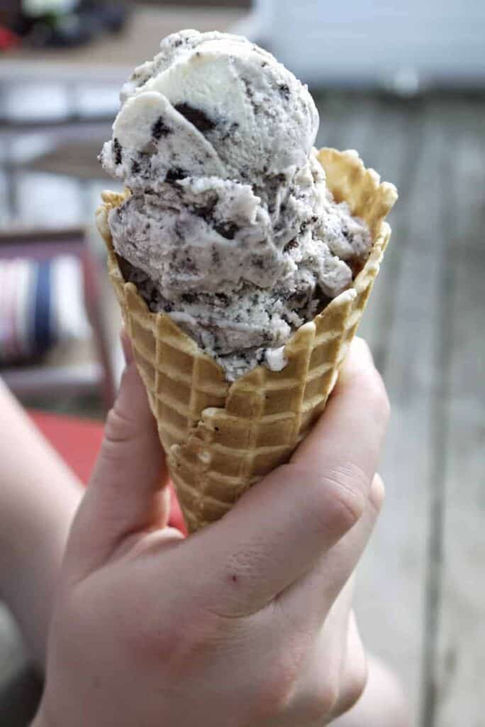 Oreo ice cream in a large waffle cone