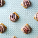 Rolo Pretzel Delights: Rolo Pretzel Delights are a super simple and quick holiday treat that only needs three ingredients: Pretzels, Rolos and pecans! | stressbaking.com