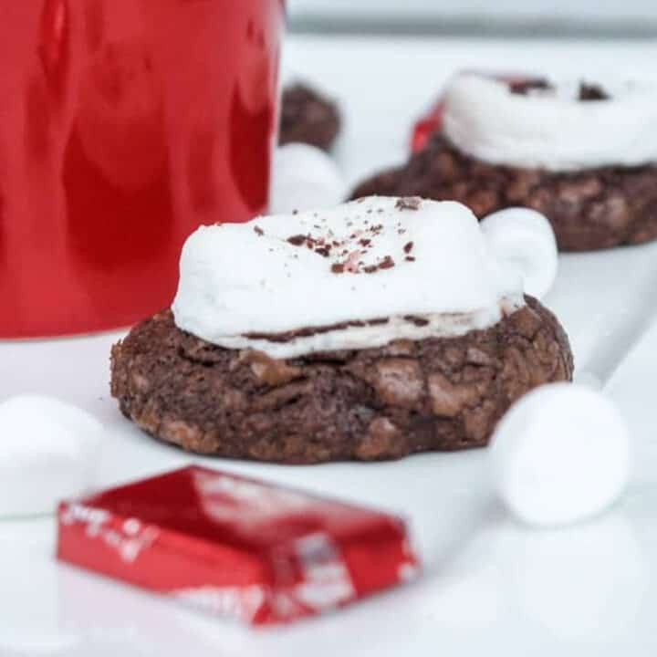 Crinkled chocolate cookies topped with fluffy white melty marshmallow