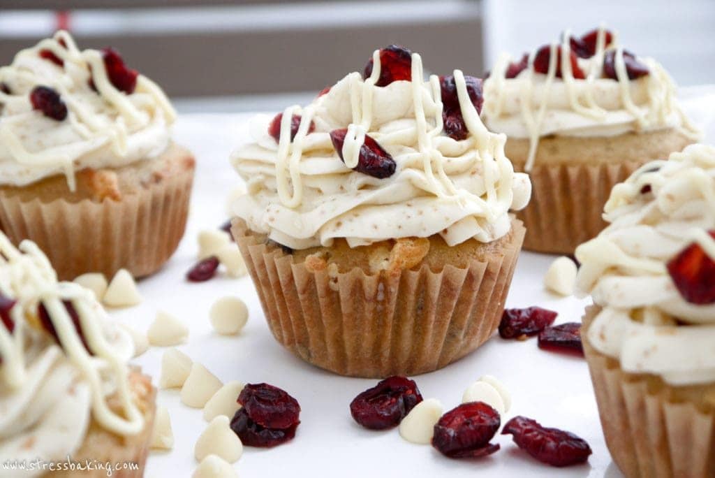 Cranberry Bliss Cupcakes: My favorite Starbucks treat turned into a cupcake! Blondie cupcakes packed with white chocolate and cranberries, topped with a sweet, tangy white chocolate cream cheese frosting. | stressbaking.com
