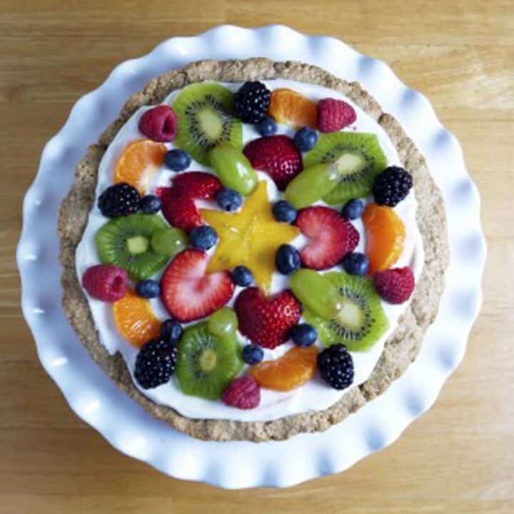 An oatmeal pizza crust topped with fresh fruit