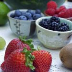 Strawberries, blackberries and blueberries in cute dishes