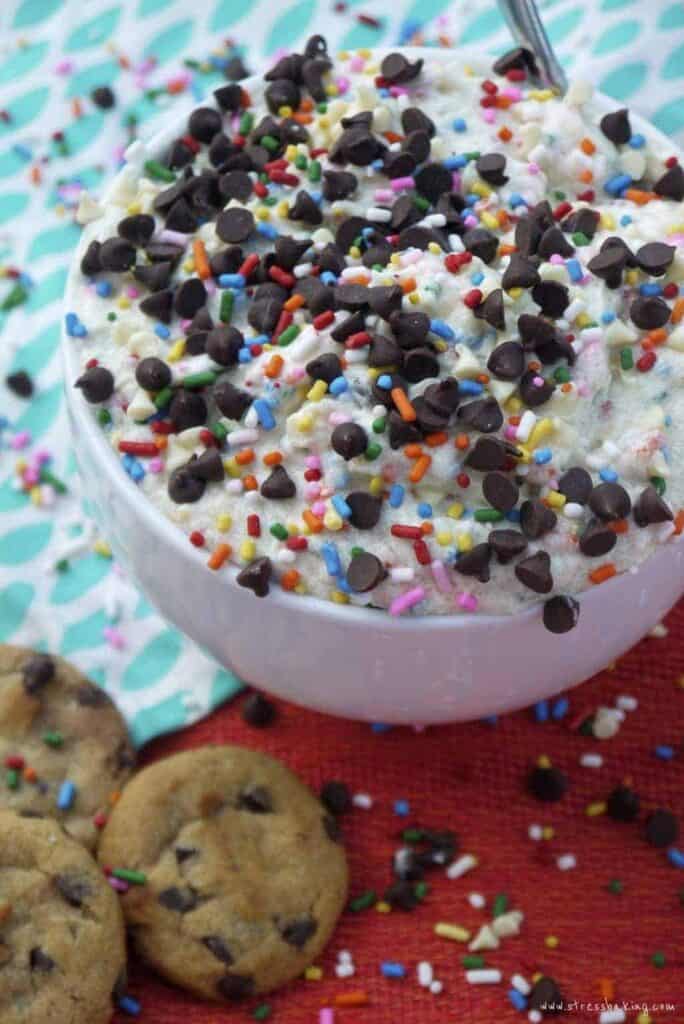 Funfetti Eggless Cookie Dough: Cookie dough that tastes like cake batter, with no baking required. The perfect snack for when you just NEED some cookie dough, but can't handle the idea of turning on the oven. Plus, sprinkles! | stressbaking.com