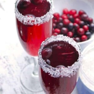 Cranberry Mimosas and a bowl of fresh cranberries