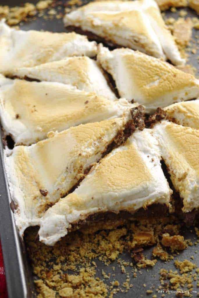 S'mores Toffee Bark: Graham crackers are smothered in butter and brown sugar, then topped with chocolate and marshmallows for a easy-to-make and addictive treat. | stressbaking.com #stressbaking #smores #naitonalsmoresday #toffee #bark