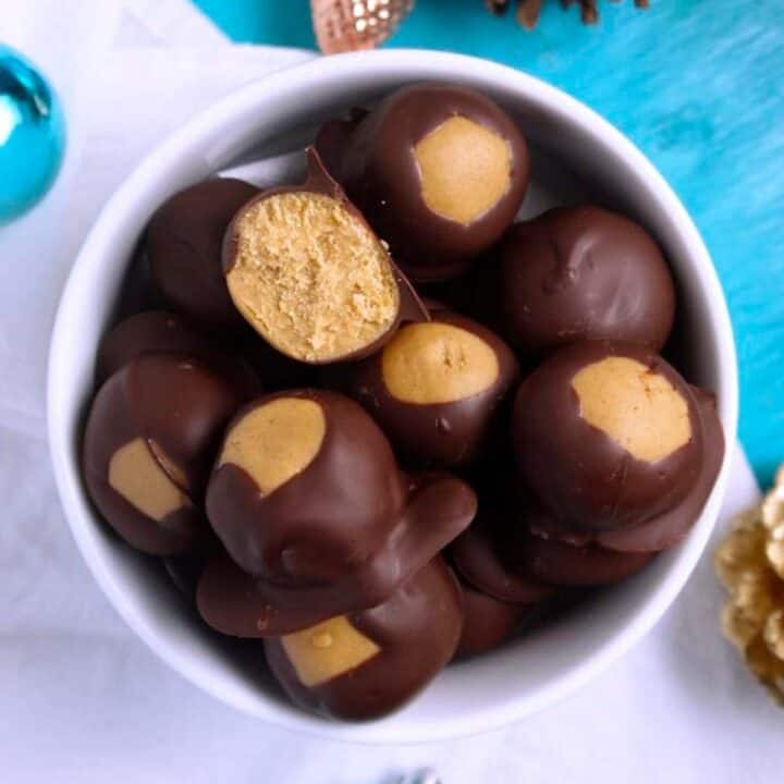 A white bowl filled with buckeye ball candy