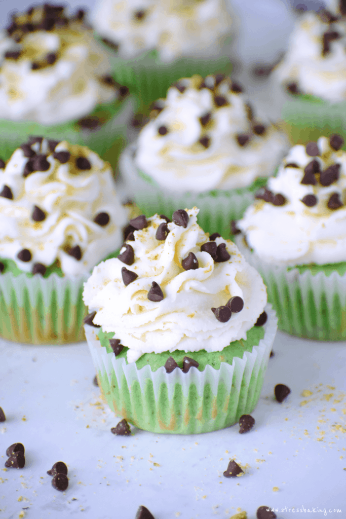 Pistachio cupcakes with cannoli frosting: Gorgeously green, light, fluffy pistachio cupcakes topped with a creamy cannoli frosting with hints of orange and lemon zest! | stressbaking.com