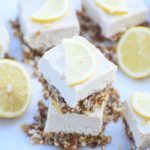 Raw Lemon Cheesecake Bars: A creamy, rich, lemony coconut cashew cream filling sits atop a naturally sweetened nut crust for the perfect healthy dessert!