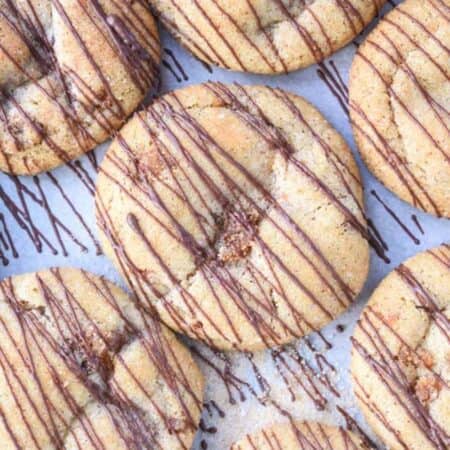 Maple bacon snickerdoodles with chocolate drizzled on the top