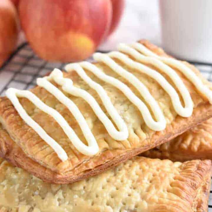 Apple cinnamon toaster strudel with white icing drizzled on top