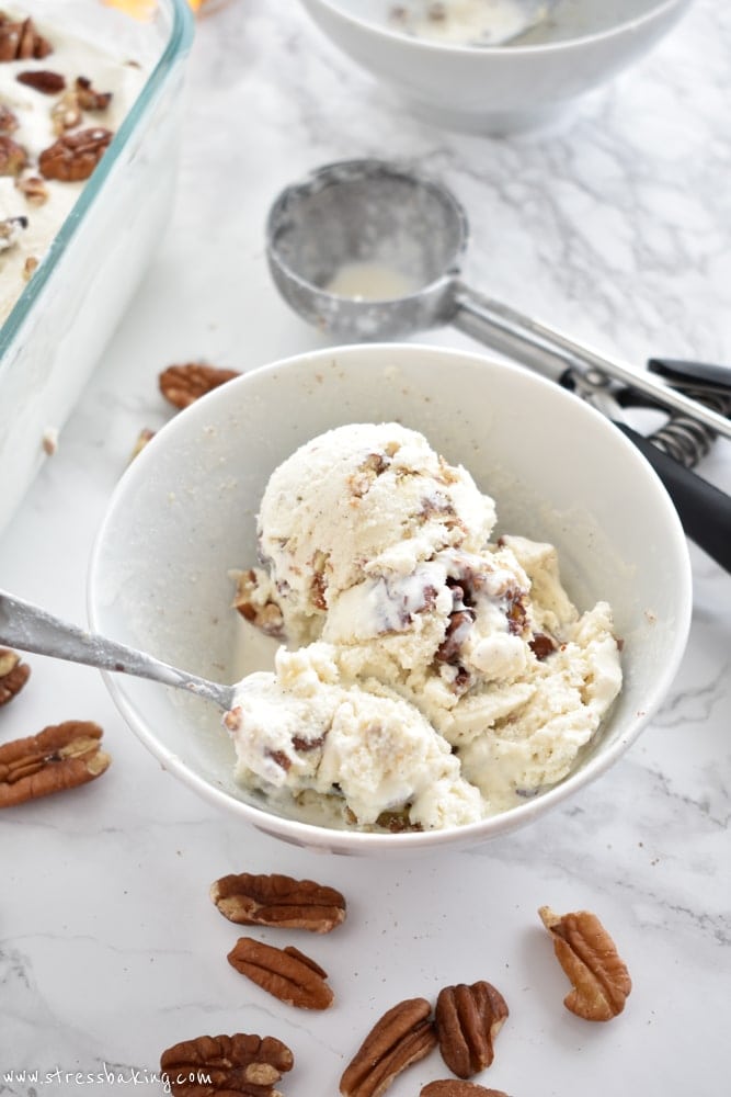 Bourbon Butter Pecan Ice Cream: Light, soft vanilla ice cream with a hint of bourbon flavor and loaded with buttery sweet roasted pecans. | stressbaking.com #icecream #boozydessert #boozy #butterpecan
