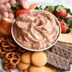 Nutella Champagne Dip: A super creamy, fluffy, whipped Nutella dip that gets a tangy upgrade from the addition of champagne. Pairs perfectly with fruit, graham crackers, pretzels and more! | stressbaking.com #holidays #boozy #dessert #champagne #nutella #newyearseve #partydip