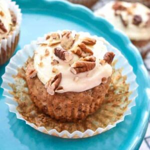 Hummingbird Cupcakes: Hummingbird cake is a classic southern favorite! I've made them into perfectly moist cupcakes filled with bananas, pineapple, and toasted pecans and topped with a tangy cream cheese frosting. | stressbaking.com #hummingbirdcake #banana #pineapple #cupcakes #creamcheese #frosting