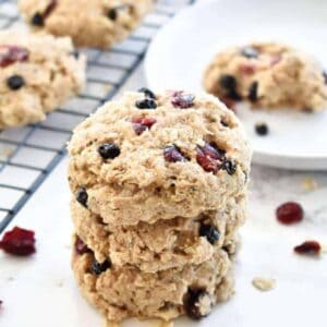 A stack of Banana Berry Breakfast Cookies on a white counter