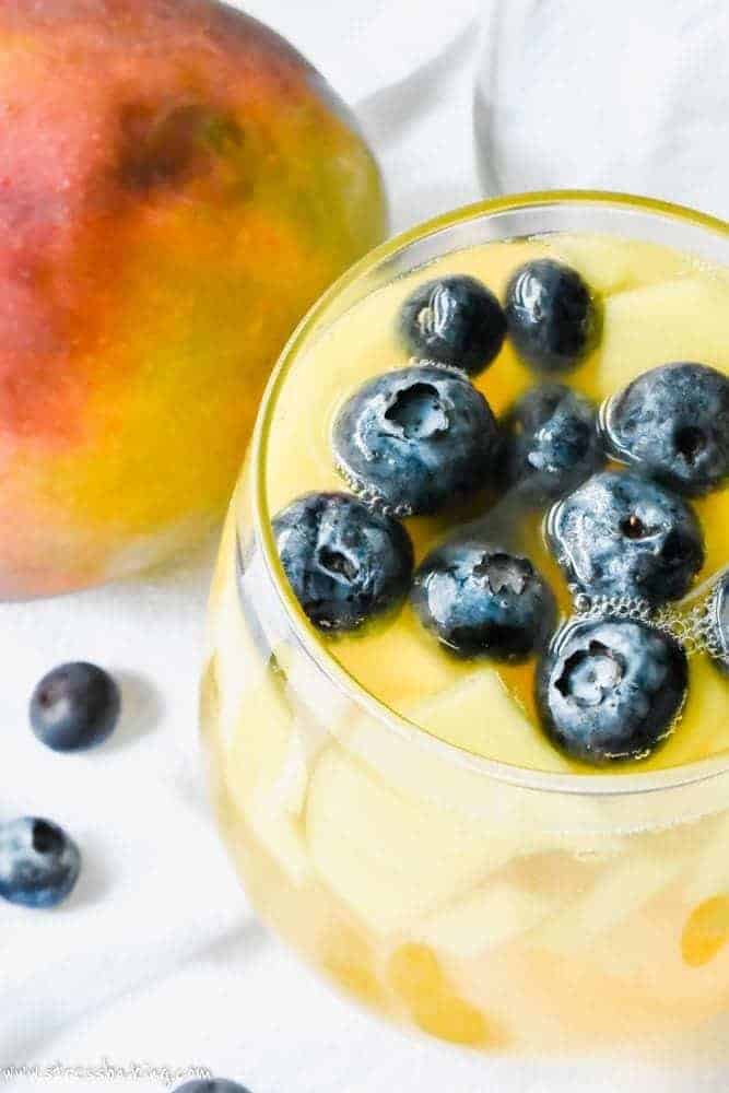 Mango Ginger Sangria with blueberries