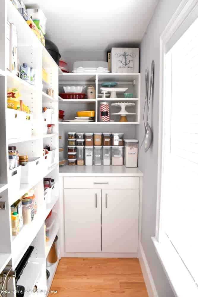 California Closets White pantry shelving with cabinet and drawer