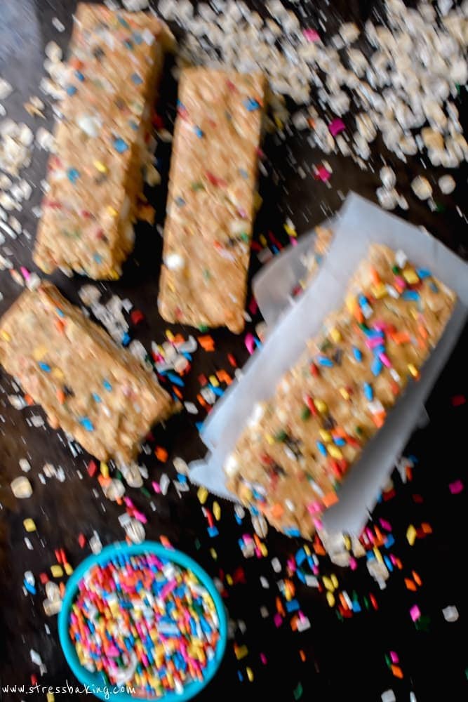 Chewy Funfetti Granola Bars being knocked over by a dog