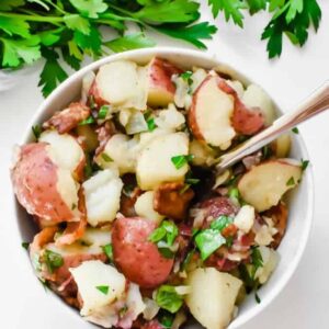 My favorite traditional German potato salad dressed with a dijon vinegar dressing and served warm. The perfect cold weather side dish!