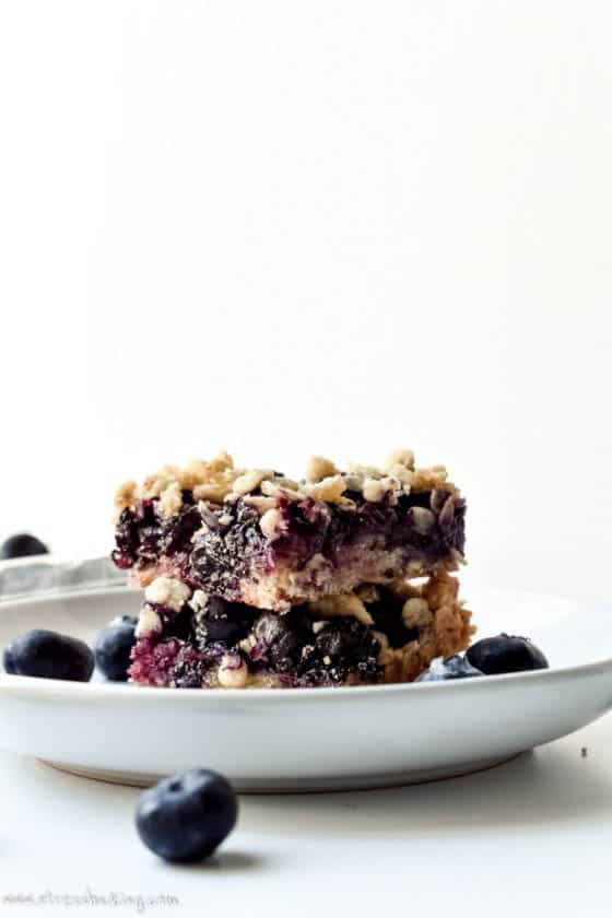 Blueberry Oatmeal Bars stacked on a plate