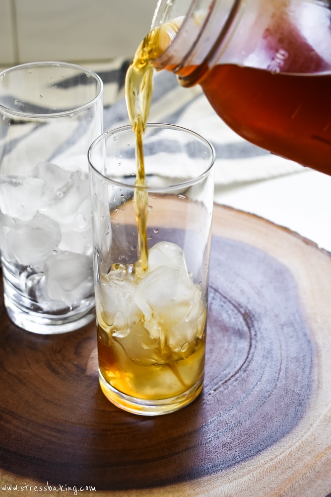 Cold brew coffee being poured into glass of ice