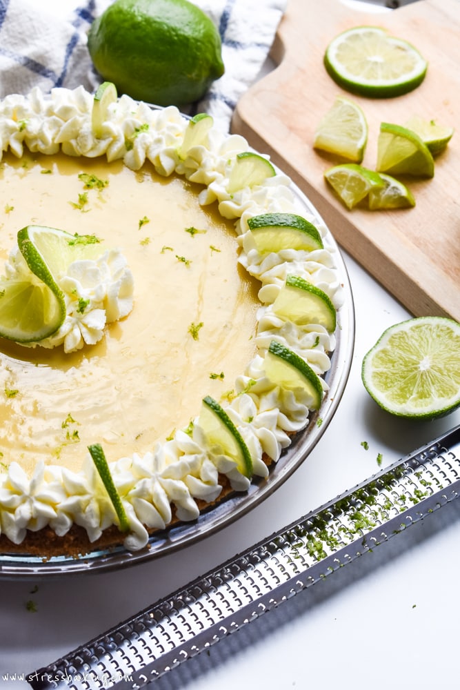 Key Lime Pie with a lime and zester