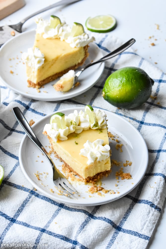 Key Lime Pie slices on a blue and white dish towel