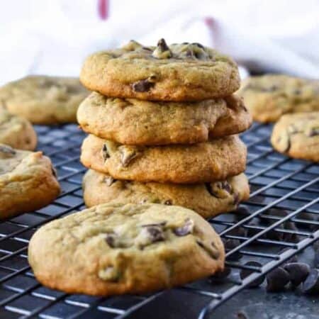 A stack of Soft and Chewy Pumpkin Chocolate Chip Cookies