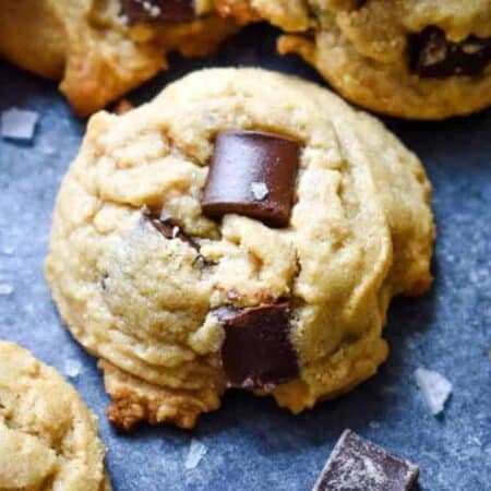 Close up of a peanut butter cookie with large chocolate chunks