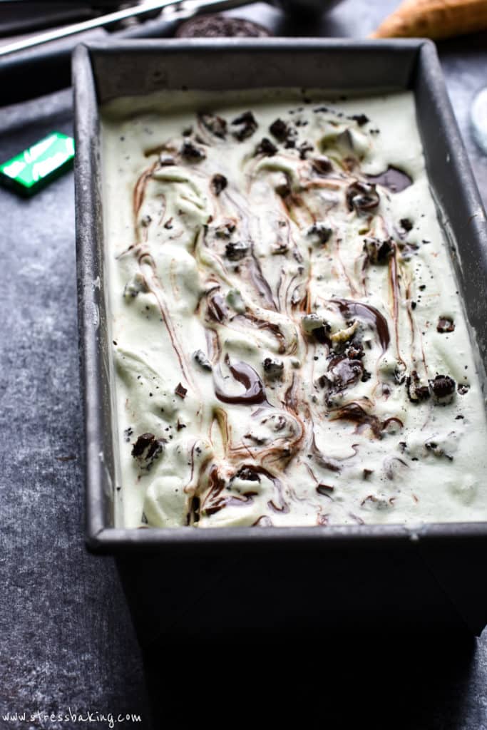 A pan of mint chocolate chip ice cream loaded with add ins
