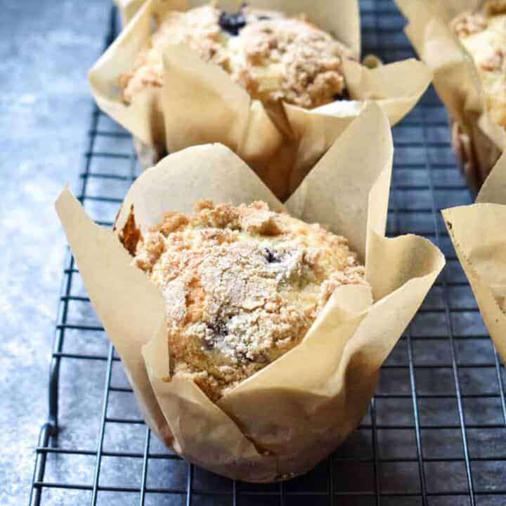 Blueberry muffin in a homemade parchment paper muffin liner