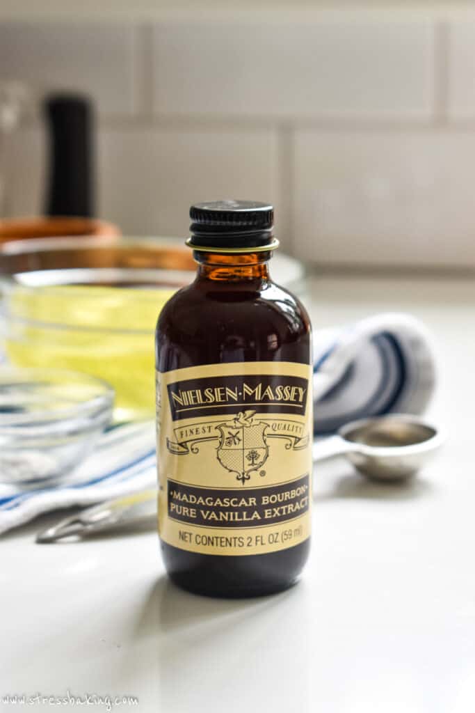 A bottle of Nielsen-Massey Vanilla on a white counter