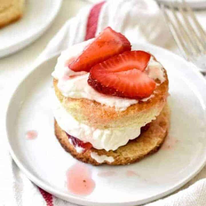 Homemade strawberry shortcake on a white plate