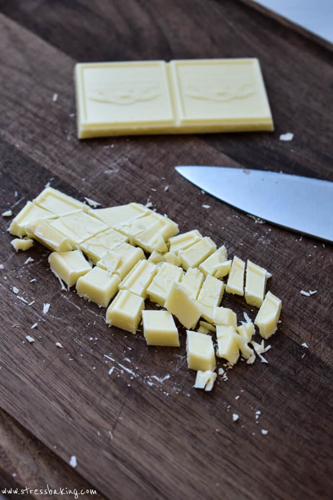 Chopped white chocolate on a cutting board