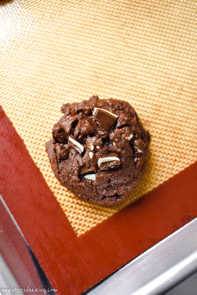 A chocolate mint cookie on a baking sheet