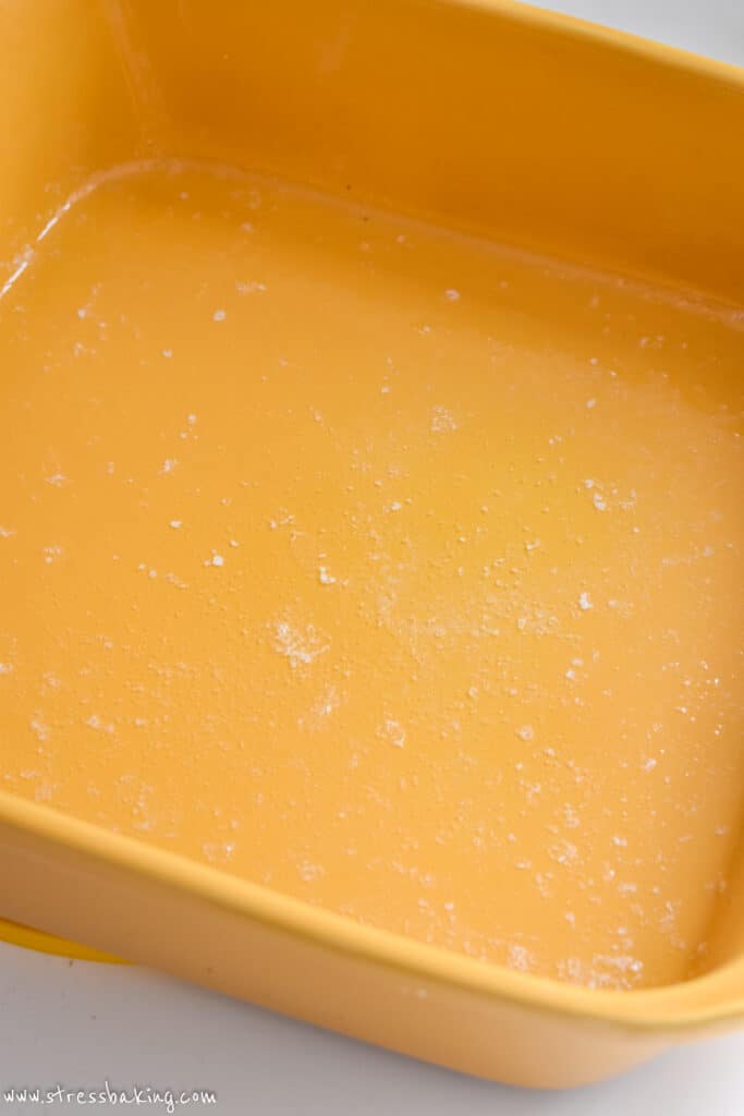 Melted butter in a yellow baking dish