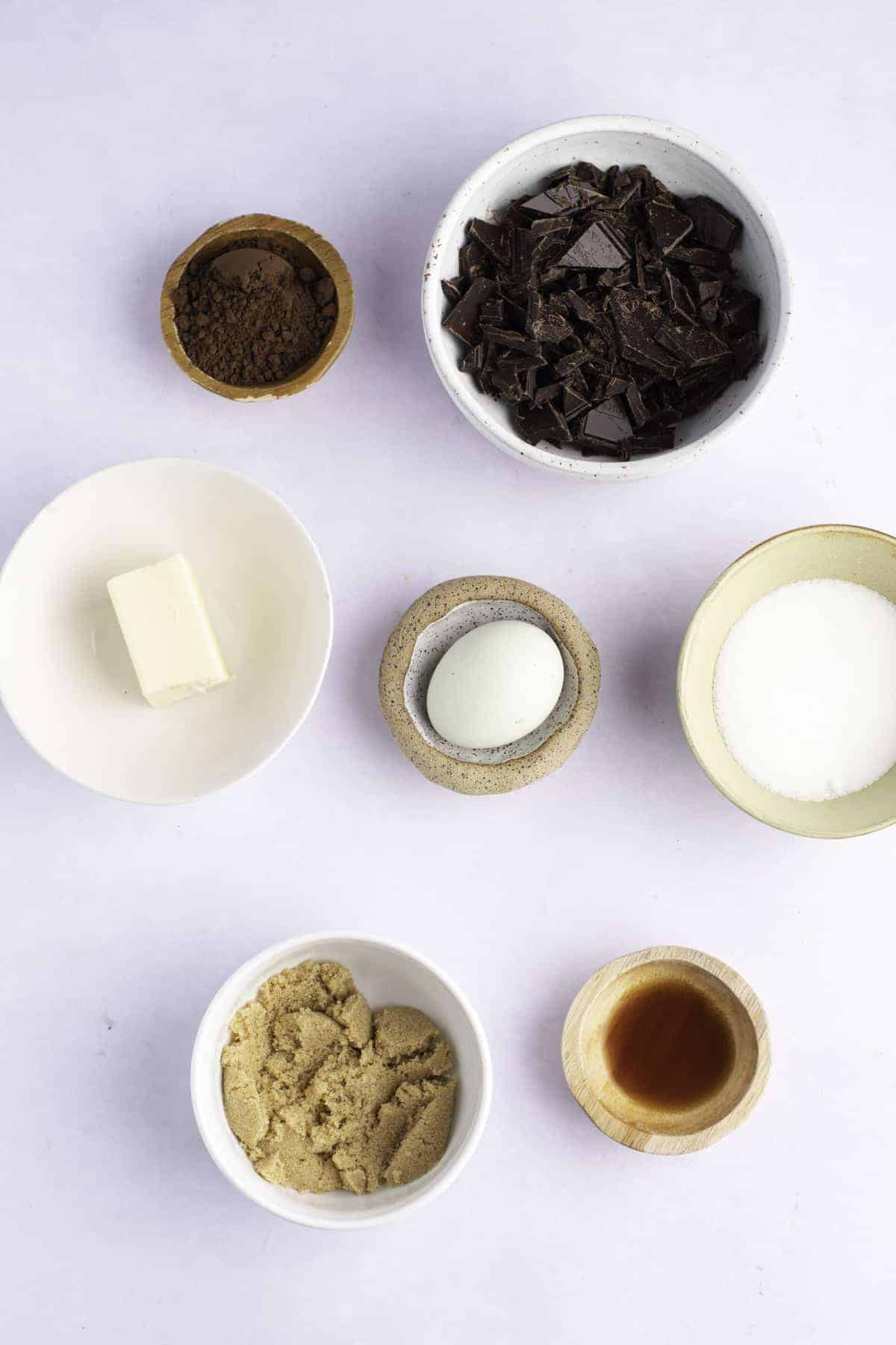 Ingredients in small bowls for brownie cookies