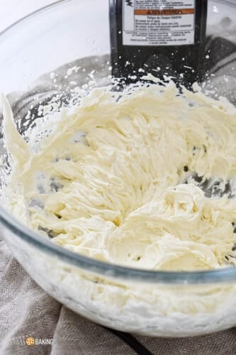 Whipped cream in a clear bowl