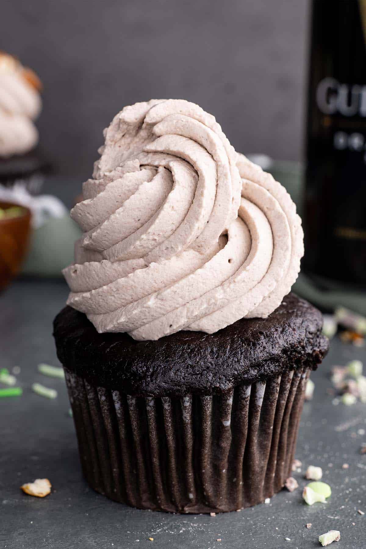 Chocolate cupcake topped with a big swirl of chocolate Guinness whipped cream