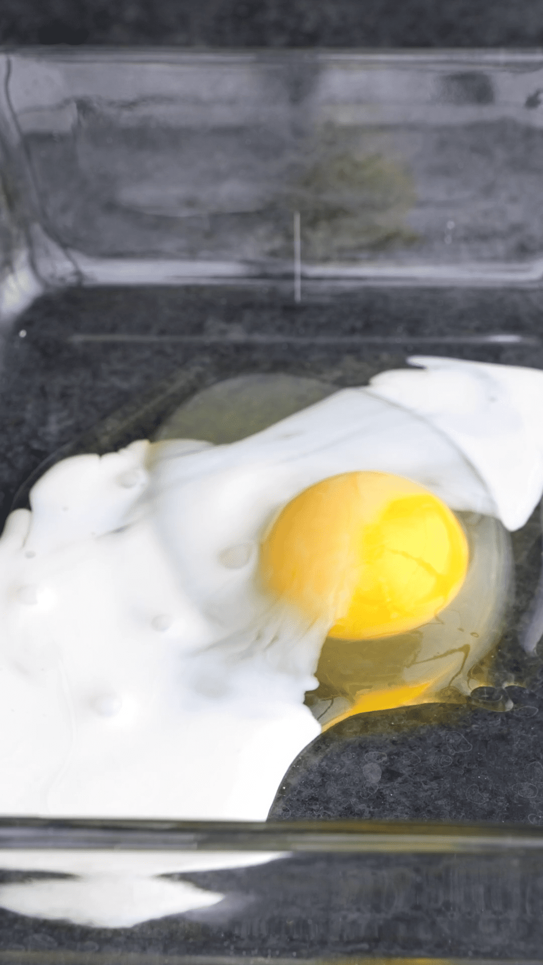 Combining egg and milk in a clear dish