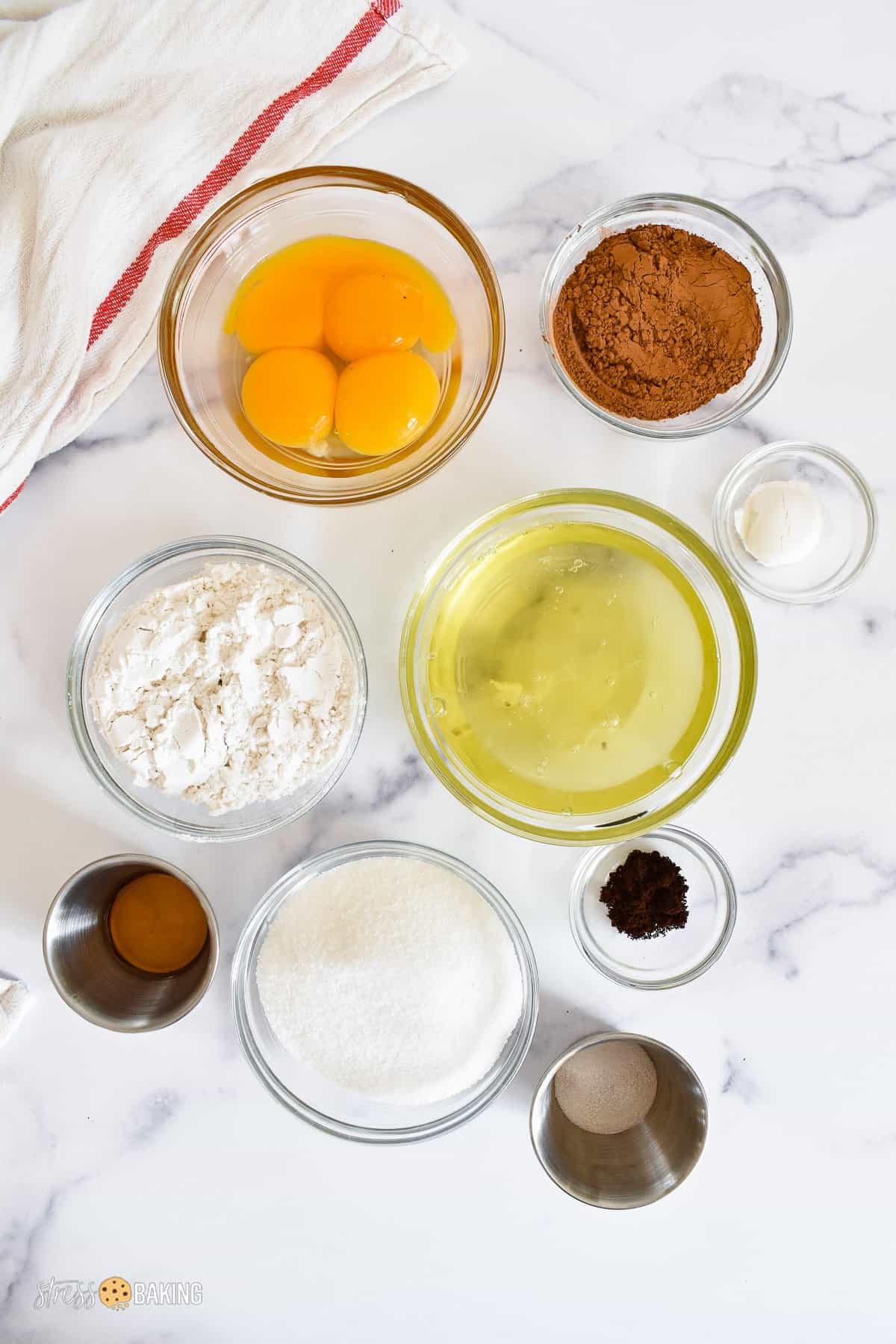 Ingredients for yule log cake on a marble counter