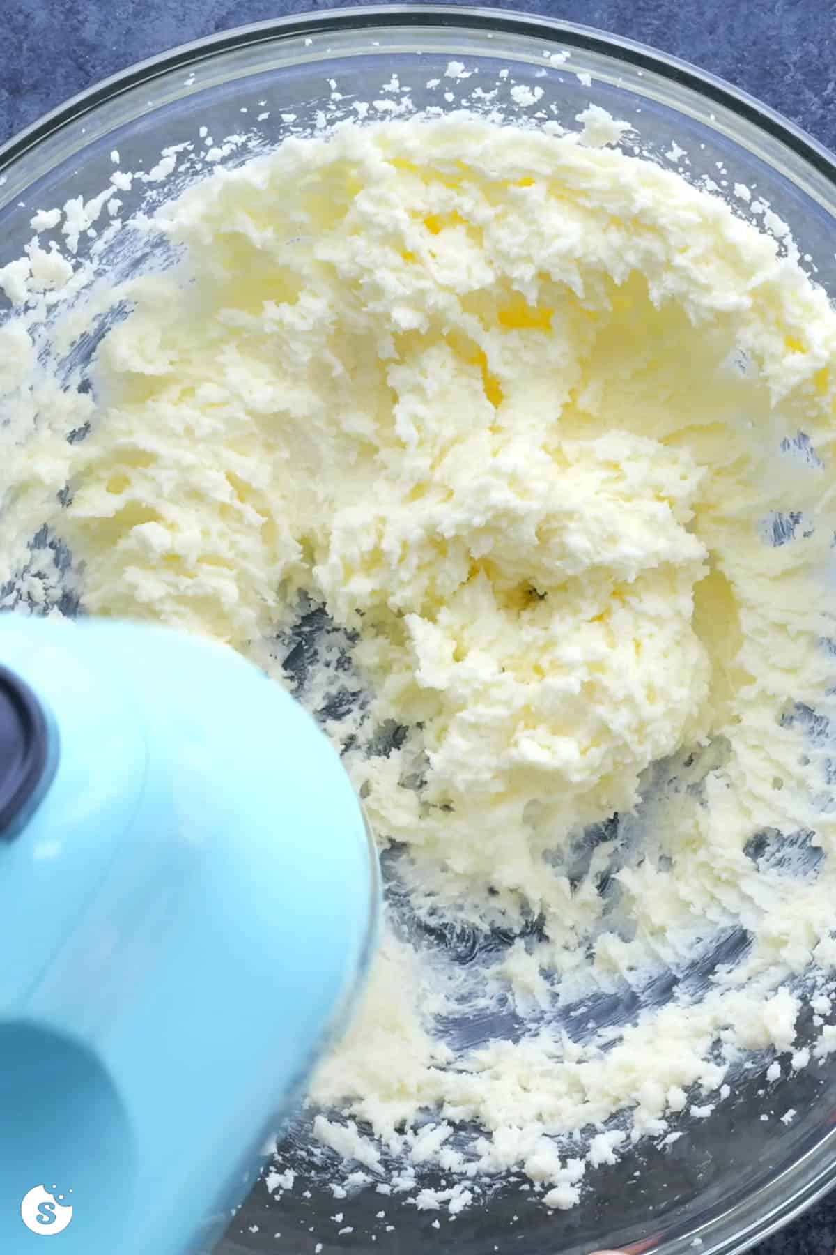 Creamed butter in a clear glass bowl